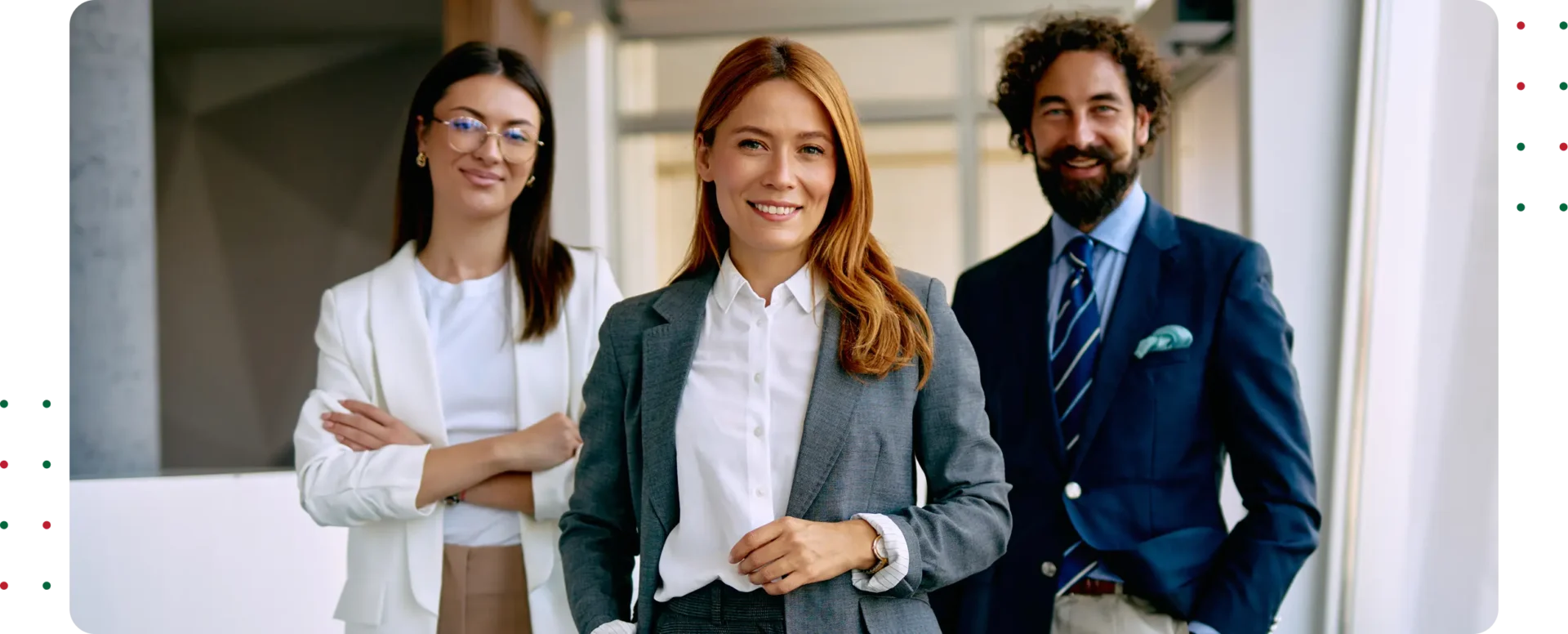 Business team smiling confidently at camera