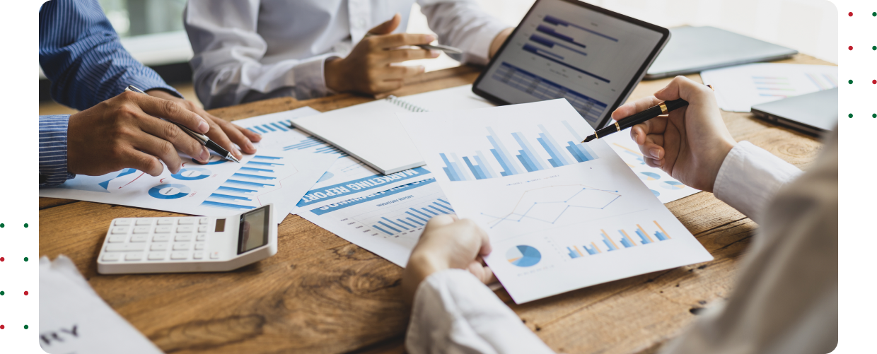 Professionals discussing financial reports and statistics